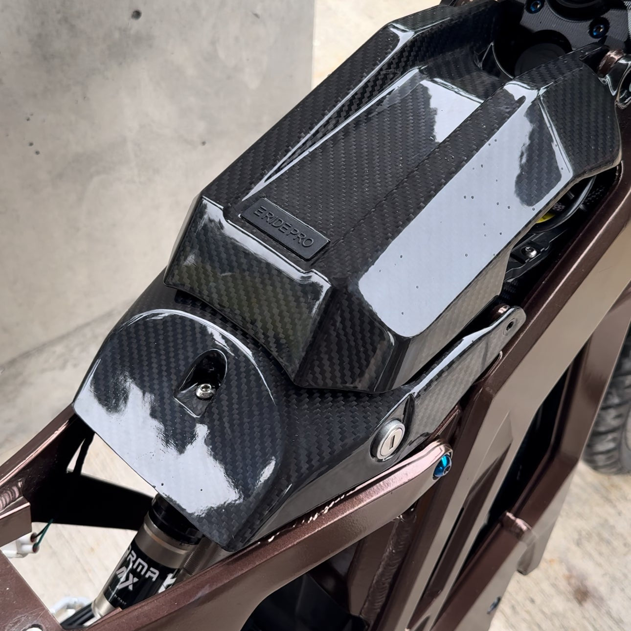 Eride carbon battery lid lock cover